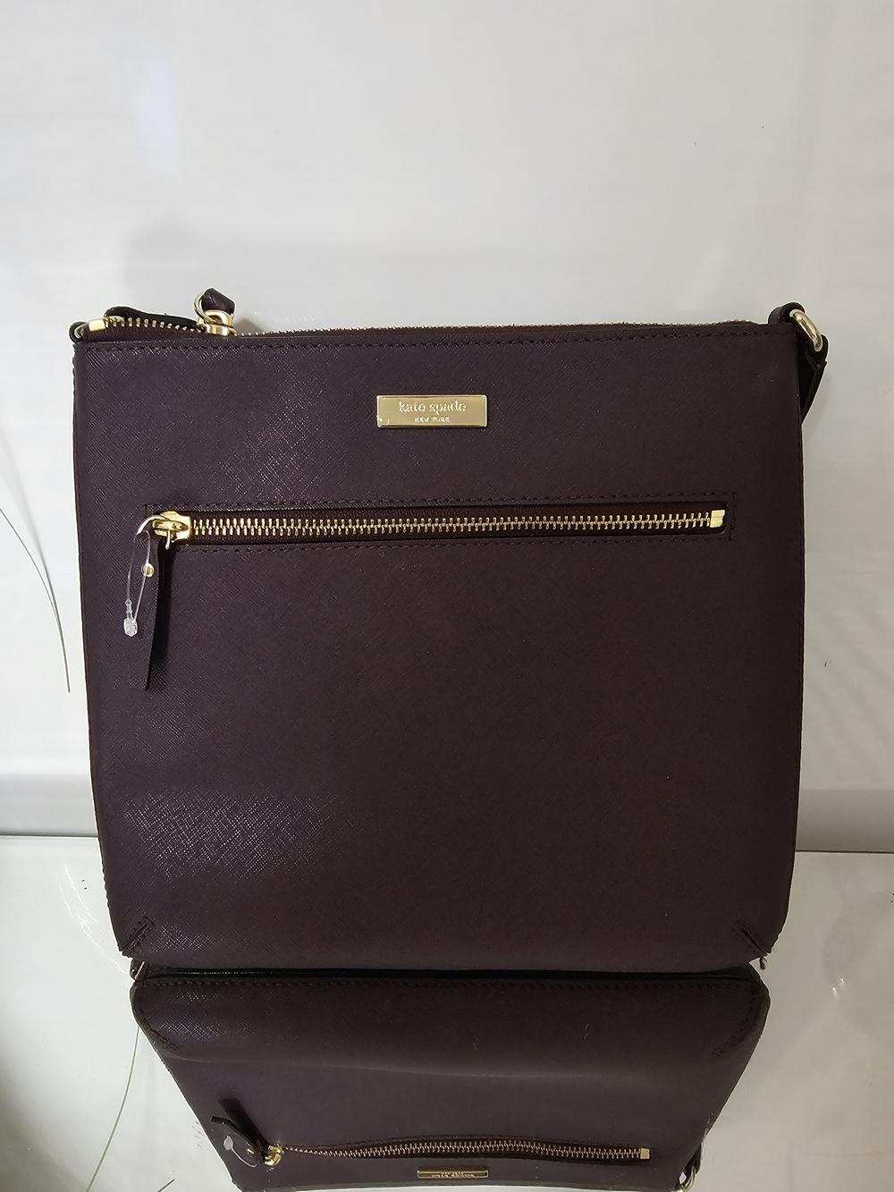 kate spade Laurel Way Rima  plum crossbody with gold-tone hardware